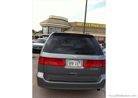 Grey Honda Oddyssy - rear