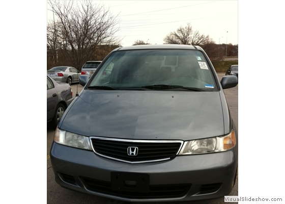 Grey Honda Oddyssy - front
